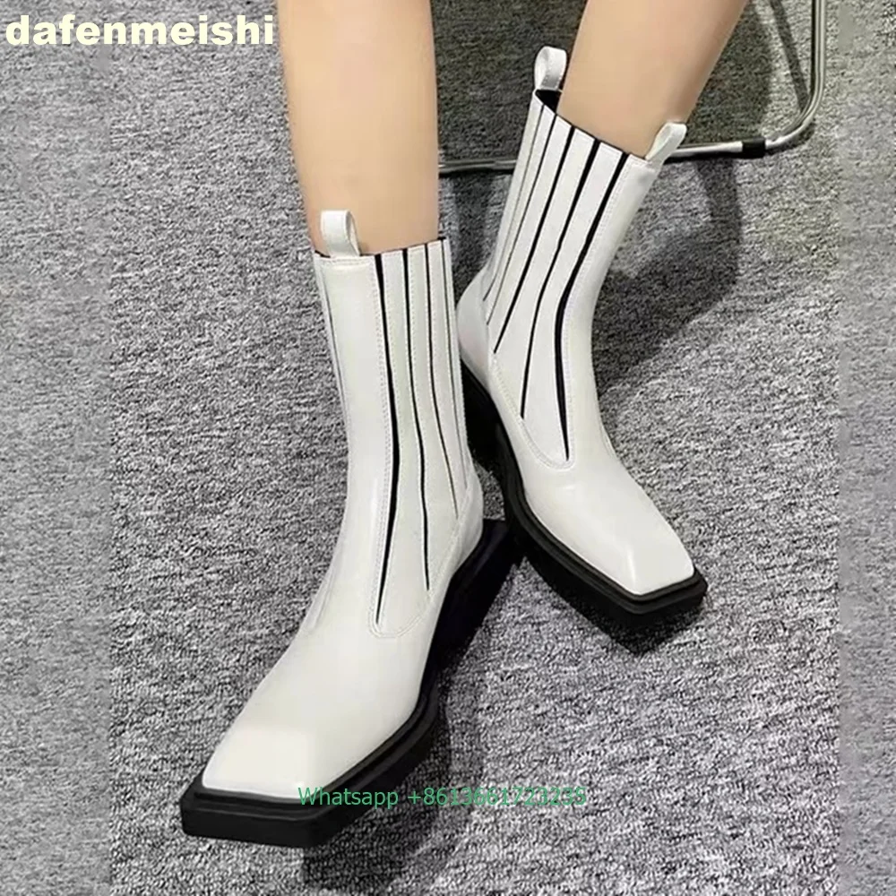 Street Fashion Rome 2025 - Bottines en cuir verni noir à