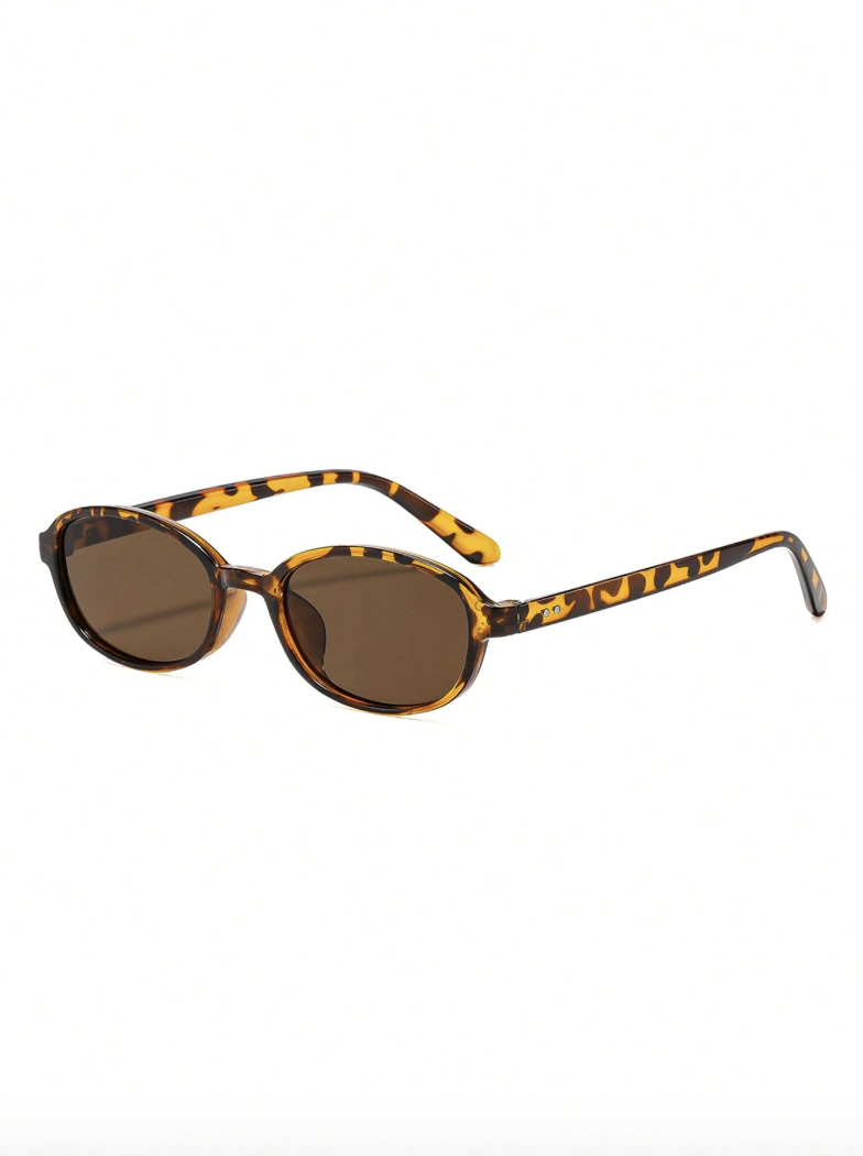Une paire de lunettes de solei - Street Fashion Look avis et prix